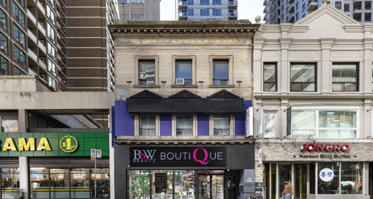 Upper floor office and retail space at 750 Yonge Street Toronto with street-level storefront and surrounding high-rise buildings